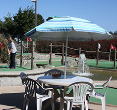 photo of shaded table at Ed's Mini Golf and Arcade.